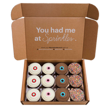 Load image into Gallery viewer, Assorted Dozen National Shipping Box includes a dozen best-sellers – Red Velvet, Vanilla, Dark Chocolate, and Sprinkle. not-bg
