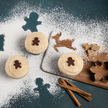 Load image into Gallery viewer, gingerbread cupcakes topped with gingerbread man decorations not-bg