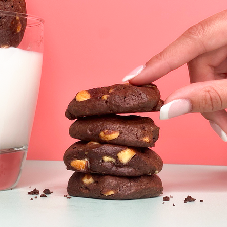 stack of four double chocolate chip cookies. not-bg