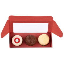 Load image into Gallery viewer, Sprinkles January Mini Sampler with 1 red velvet, 1 dark chocolate, and 1 vanilla mini cupcake. not-bg
