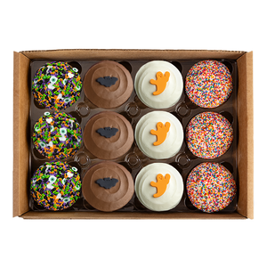 overhead shot of Halloween-themed cupcakes with various decorations not-bg