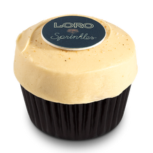 Load image into Gallery viewer, Side view of the Loro Salted Caramel Miso cupcake not-bg
