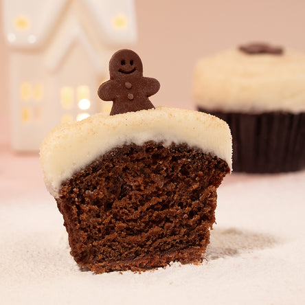 gingerbread cupcakes topped with gingerbread man decorations