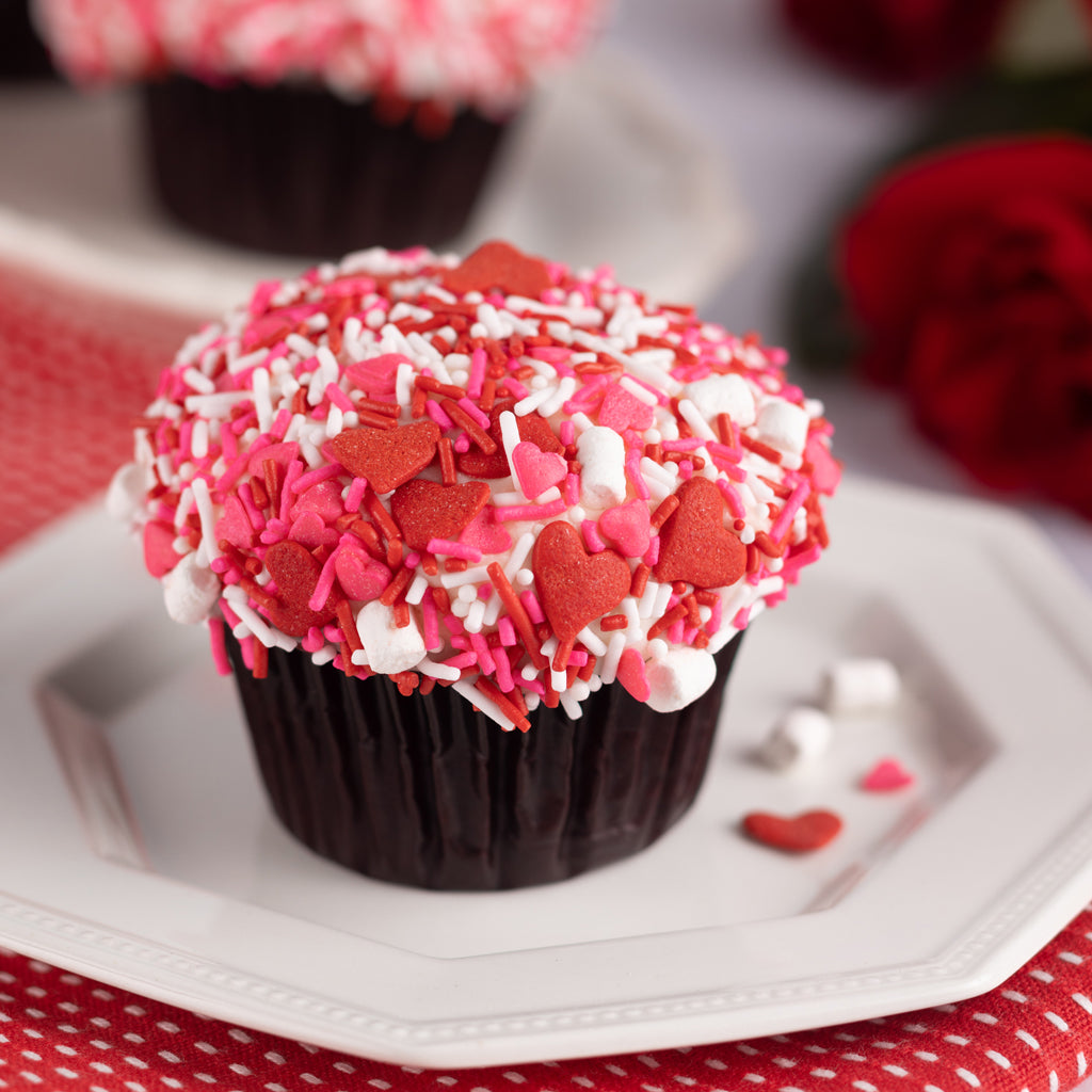 Heartthrob Red Velvet cupcake on plate. not-bg