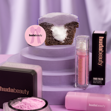 Load image into Gallery viewer, Huda cut in half surrounded by beauty products not-bg
