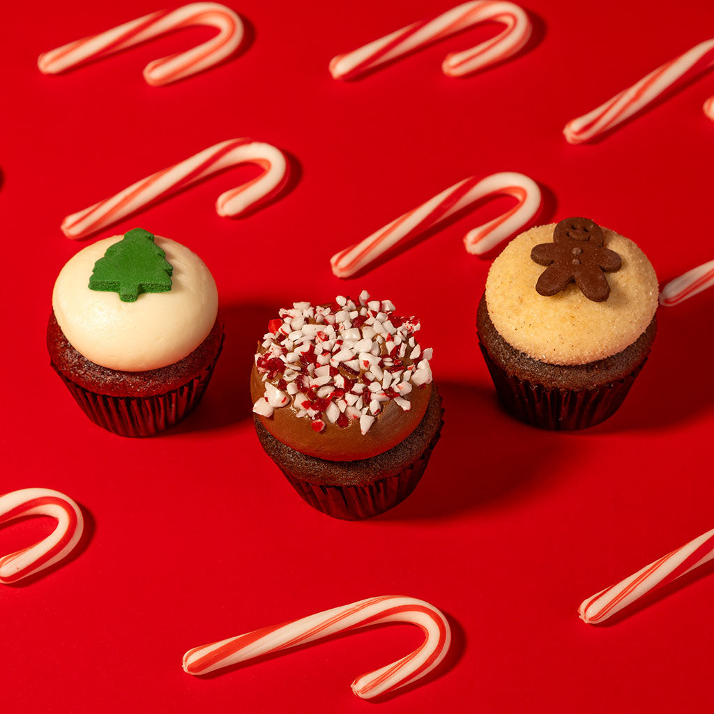 mini holiday cupcakes with candy cane not-bg