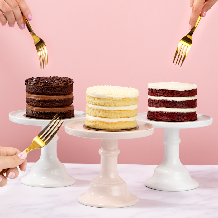 3 flavors of our personal layer cakes in flavors dark chocolate, vanilla, and red velvet not-bg
