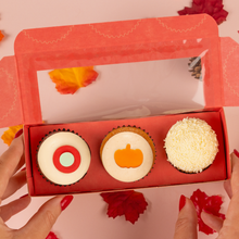 Load image into Gallery viewer, Three mini cupcakes in a red box with fall decor
