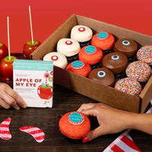 Load image into Gallery viewer, Overview of Patchology Candy Apple Assorted Dozen, with 3 Red Velvet, 3 Candy Apple, 3 Dark Chocolate, and 3 Sprinkle Cupcakes.

