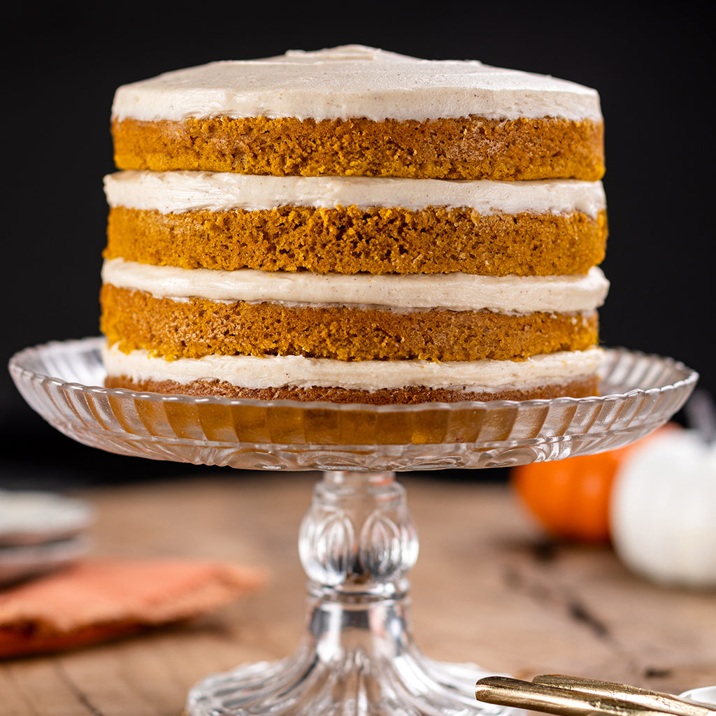 8-inch pumpkin layer cake with four layers of cake and frosting