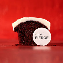 Load image into Gallery viewer, Inside view of a red velvet cupcake with an I am FIERCE dec
