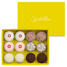 Load image into Gallery viewer, Assorted Dozen Yellow Box includes 2 Red Velvet, 2 Strawberry, 2 Vanilla, 2 Sprinkles, 2 Black &amp; White, and 2 Dark Chocolate cupcakes.
