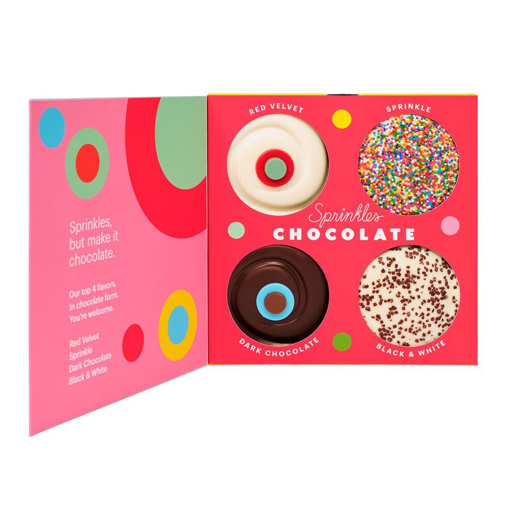 Assorted 4-Box of Chocolate Bars includes 1 Red Velvet, 1 Sprinkle, 1 Dark Chocolate, and 1 Black & White.