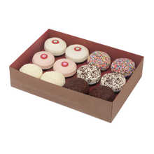 Load image into Gallery viewer, Assorted Dozen Standard Box includes 2 Red Velvet, 2 Strawberry, 2 Vanilla, 2 Sprinkles, 2 Black &amp; White, and 2 Dark Chocolate cupcakes. not-bg
