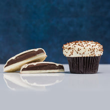 Load image into Gallery viewer, A Black &amp; White Chocolate Bar cut in half next to a Black &amp; White cupcake. not-bg
