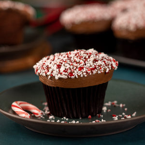 chocolate peppermint cupcake with bittersweet chocolate-peppermint frosting sprinkled with crushed peppermint candies not-g