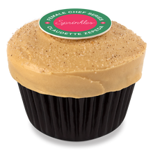 Load image into Gallery viewer, la gloria cupcake with salted caramel frosting and a dusting of cinnamon sugar not-bg

