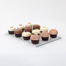 Load image into Gallery viewer, lemon assorted dozen cupcakes with red velvet, dark chocolate, lemon and sprinkle. not-bg
