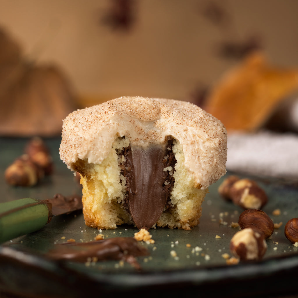 nutella french toast cupcake with whipped nutella filling, maple cream cheese frosting and cinnamon sugar