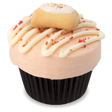 Load image into Gallery viewer, side view of pop tart cupcake with strawberry frosting finished with drizzled vanilla buttercream, red sugar crystals and a mini pop tart not-bg
