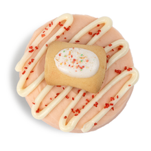 Load image into Gallery viewer, top of a pop tart cupcake with strawberry frosting finished with drizzled vanilla buttercream, red sugar crystals and a mini pop tart not-bg
