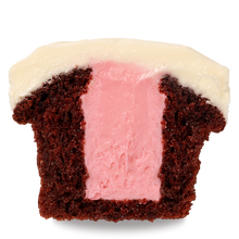 Load image into Gallery viewer, half of a gender reveal red velvet cupcake with pink vanilla buttercream filling not-bg
