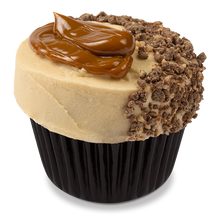 Load image into Gallery viewer, sticky toffee cupcakes with date infused buttercream frosting topped with crushed chocolate toffee crumble and caramel sauce not-bg
