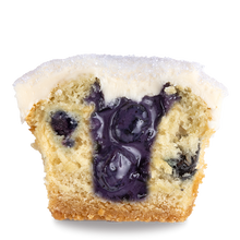 Load image into Gallery viewer, inside view of berries and cream cupcake with a blueberry studded vanilla cake, blueberry pie filling, and topped with a vanilla buttercream frosting not-bg

