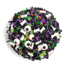 Load image into Gallery viewer, top of bewitched red velvet cupcake topped with halloween themed Fancy Sprinkles not-bg
