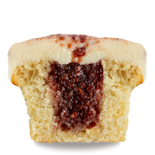 Load image into Gallery viewer, half of kir royale cupcake with sparkling rose cake, raspberry chambord jam core and cream cheese frosting marbled with raspberry chambord jam not-bg
